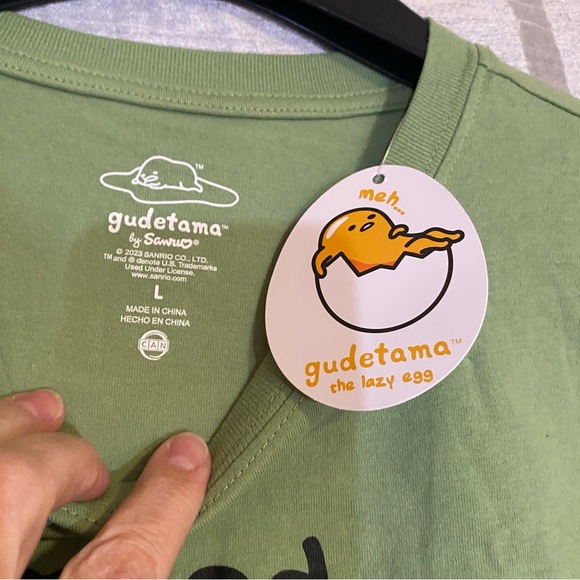 Gudetama. Sanrio Mood shirt SZ L NWT “Meh” Sad Egg! - Picture 4 of 6